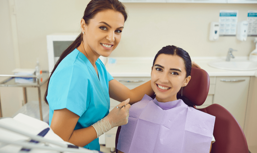 Woman receiving laser dental treatment