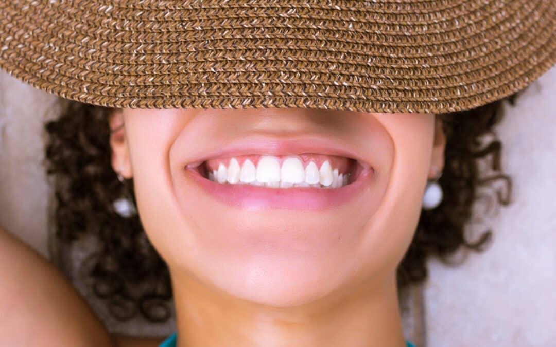 Woman in hat smiling