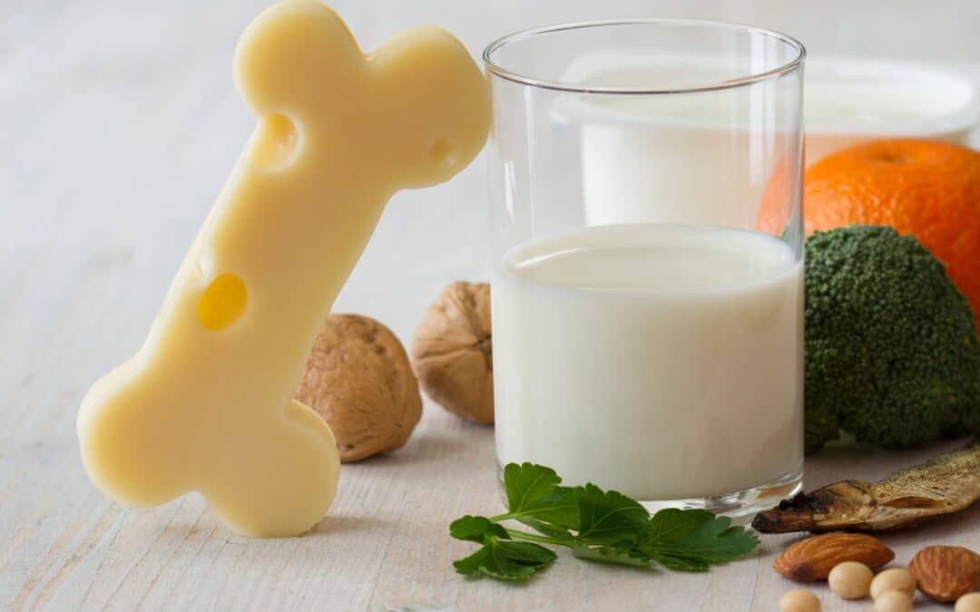 Bone shaped treat with glass of milk