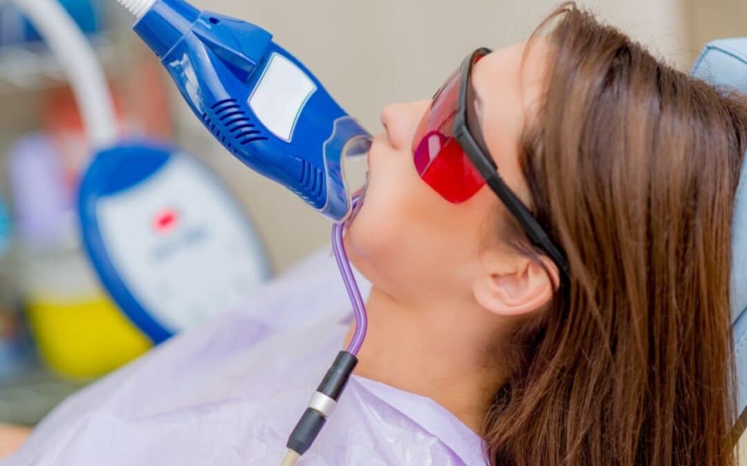 Woman getting in office teeth whitening
